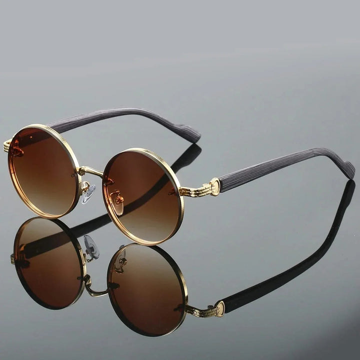 Unisex stylish round gradient lens sunglasses with UV protection and metal frame, a perfect fashion accessory.