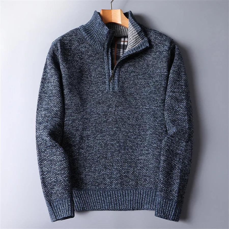 Elevated men's quarter-zip sweater with a turtleneck collar, perfect for layering & comfort.