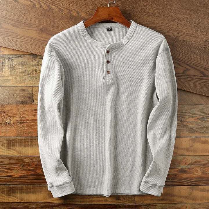 Comfortable men's long sleeve waffle knit shirt. Perfect for casual everyday wear.