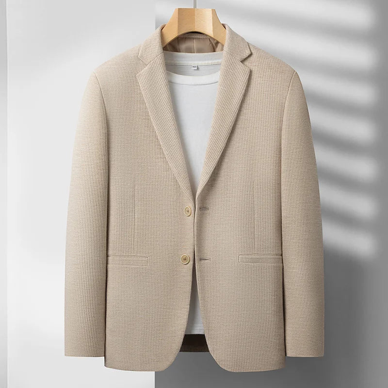 Stylish men's gray structured blazer, ideal for business meetings or elegant smart casual events.