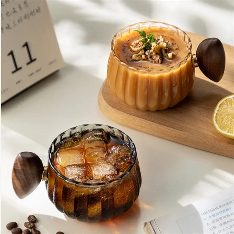 Durable borosilicate glass tea cup, showcasing its sleek design and transparency for home decor.