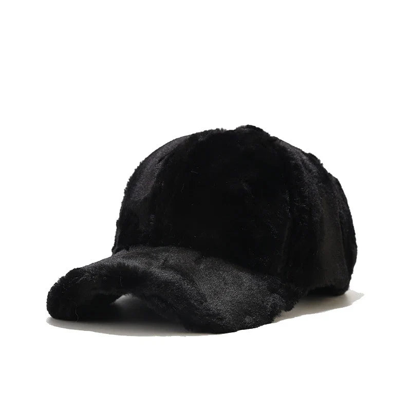 Stylish women's faux fur plush cap, perfect for a chic and cozy winter fashion statement.