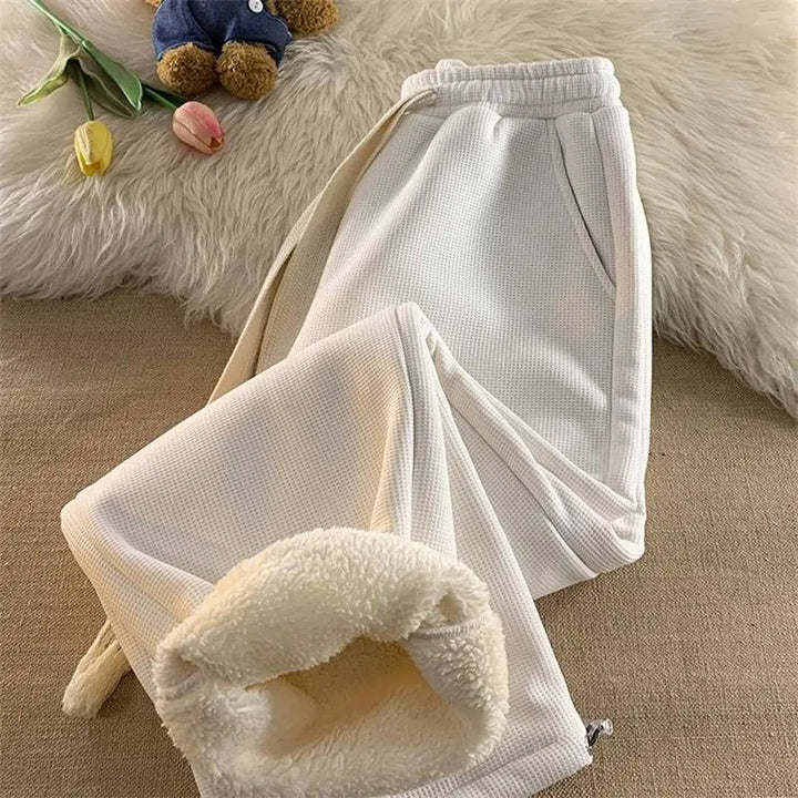 Cozy women's soft plush lounge pants for ultimate winter comfort, ideal for sleepwear & relaxed casual wear.