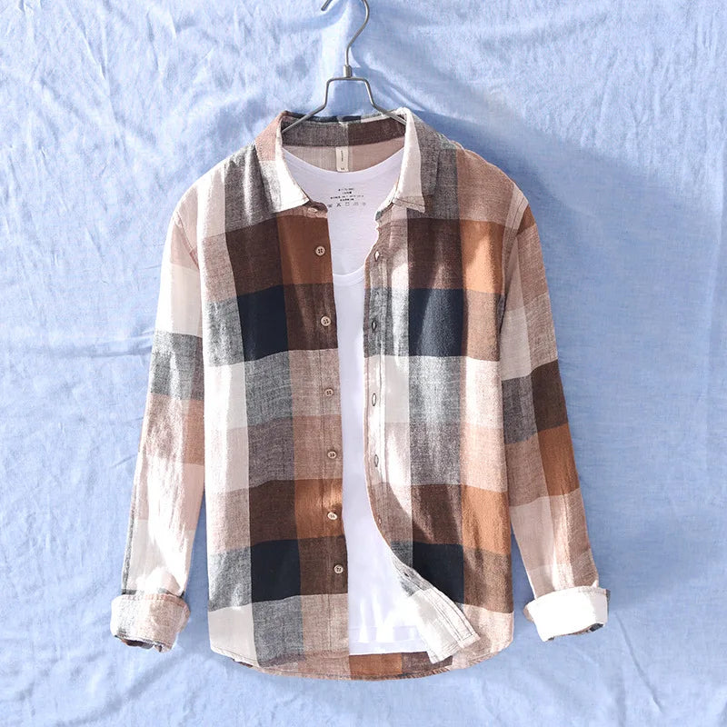 Breathable men's cotton-linen button-up shirt with a stylish checkered pattern. Versatile for casual and summer fashion.