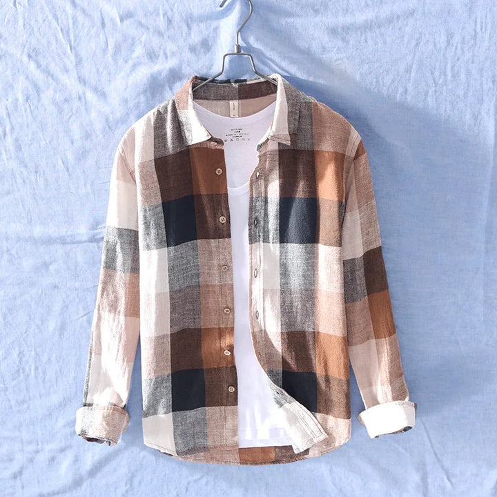 Breathable men's cotton-linen button-up shirt with a stylish checkered pattern. Versatile for casual and summer fashion.