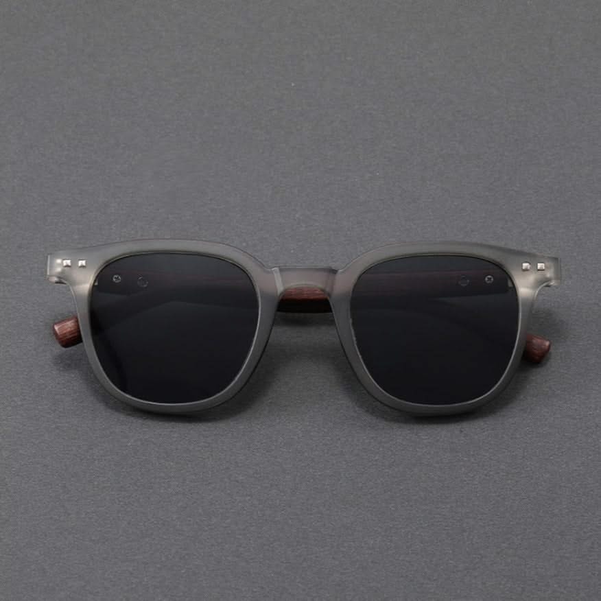 Sleek and durable unisex sunglasses with glossy acetate frames and natural wooden temples.