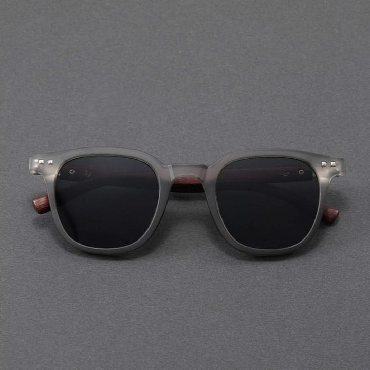 Sleek and durable unisex sunglasses with glossy acetate frames and natural wooden temples.