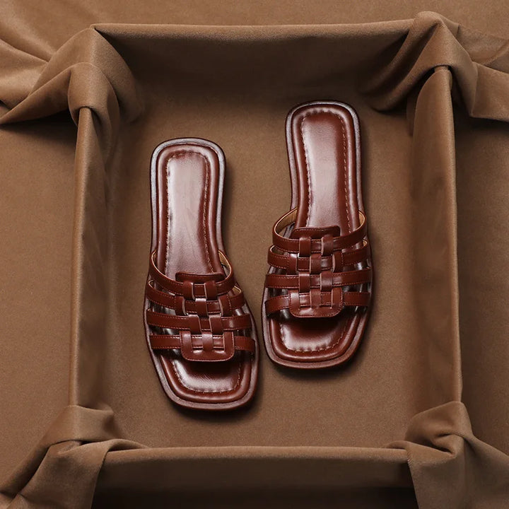 Women's Tivra slide sandals with cushioned comfort, geo cutout design, perfect for everyday summer wear.