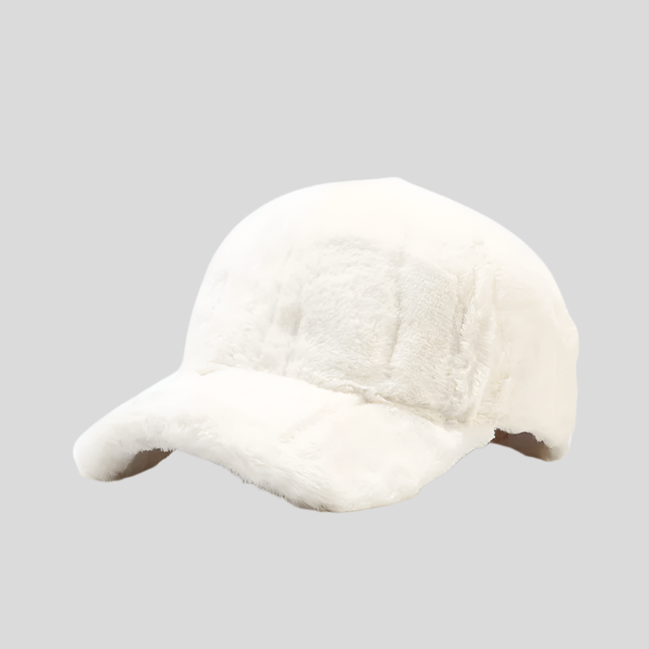 Luxurious women's faux fur plush cap, essential warm headwear for winter fashion and comfort.