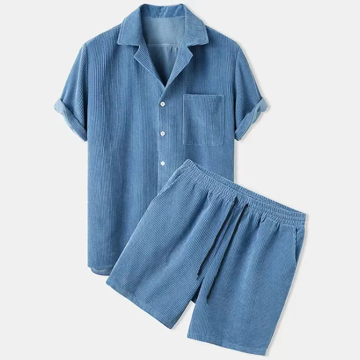 Comfortable women's two-piece summer set for effortless style. Relaxed button-up shirt & drawstring shorts. Loungewear.
