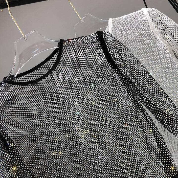 Fashionable women's sparkle t-shirt, a dazzling party top for festive and evening occasions. Glamorous shine.