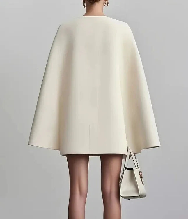 Chic women's blazer dress, V-neck, and stylish cape sleeves. Ideal for parties, cocktails, or a formal look.