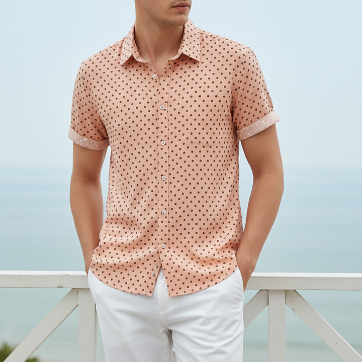 Trendy men's short sleeve polka dot beach shirt, perfect for warm weather and casual occasions.