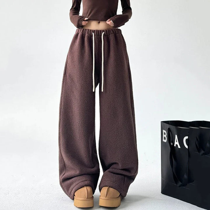 Drawstring waist unisex sweatpants, ultra-soft and cozy bottom, perfect for relaxed casual or active wear.