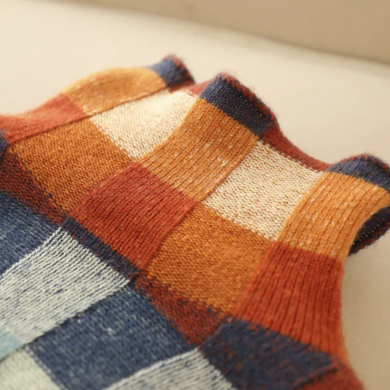 Stylish women's turtleneck sweater featuring a unique patchwork design. Perfect warm & cozy pullover for winter.