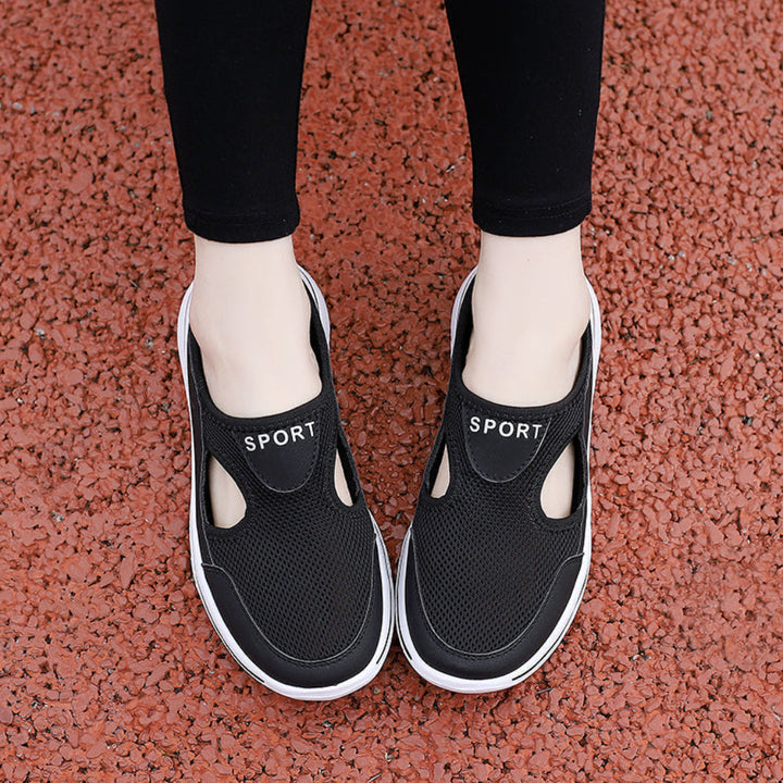 Cozy slip-on orthopedic slippers providing foot support & comfort for men & women at home.