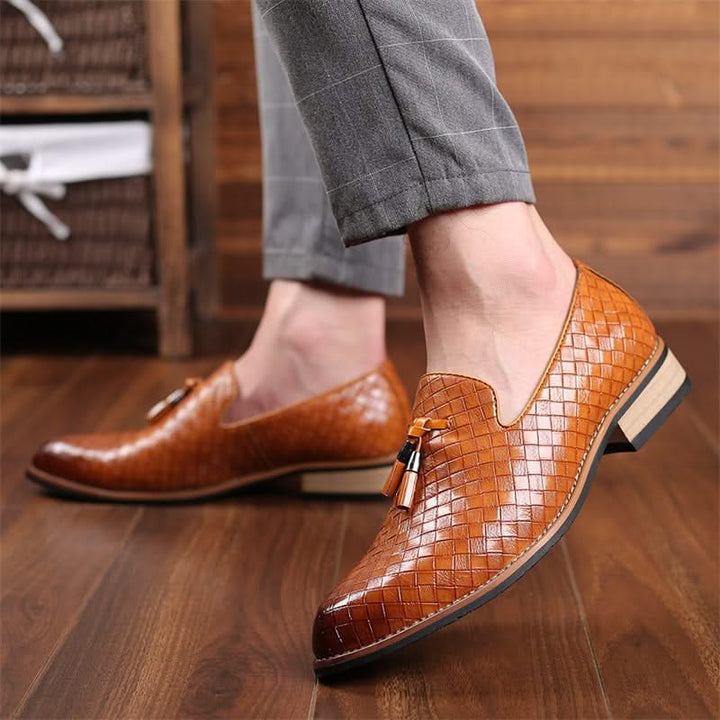 Durable men's woven loafers with classic tassels. Perfect formal footwear for modern men's fashion.