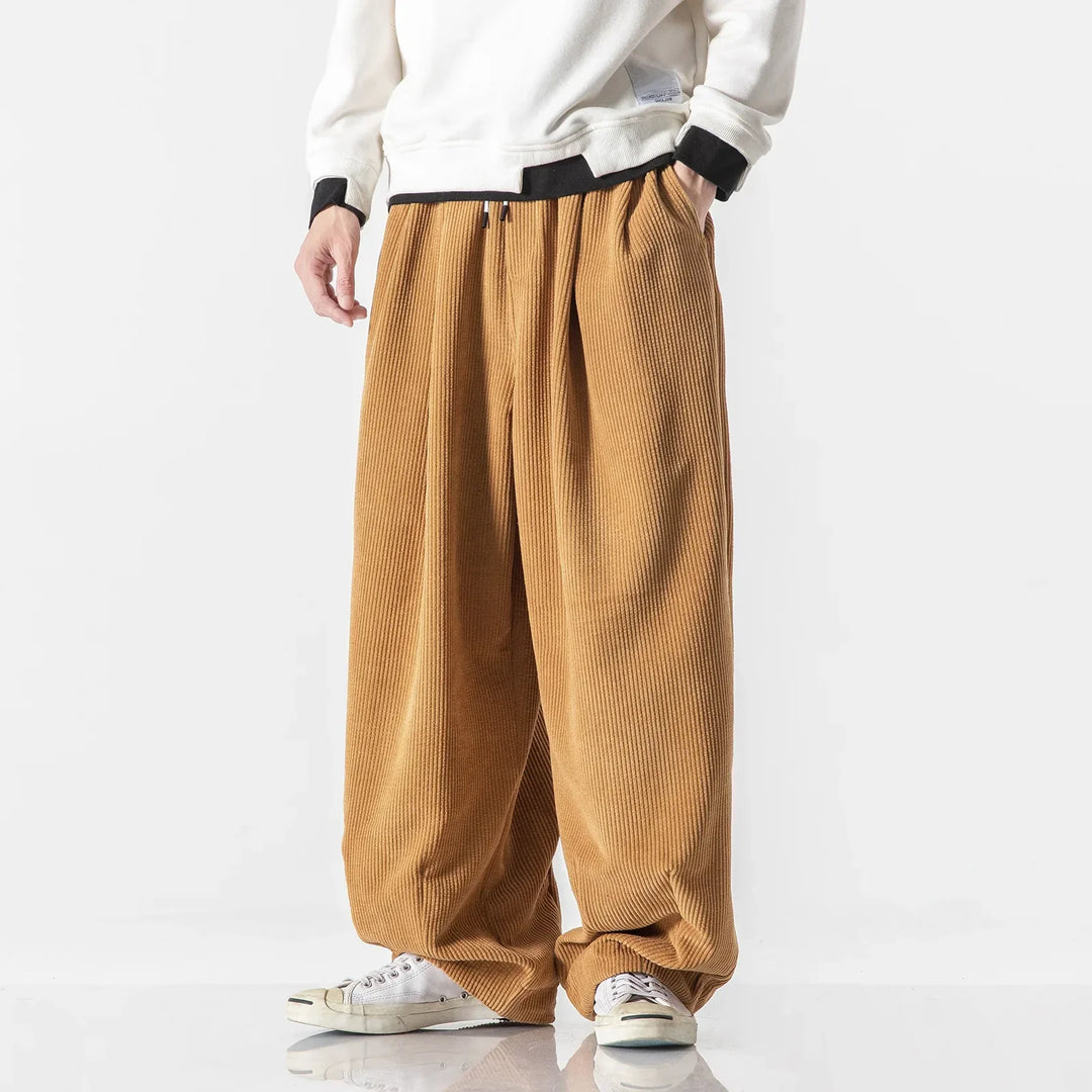 Unisex relaxed fit sweatpants in soft fabric for ultimate casual comfort.