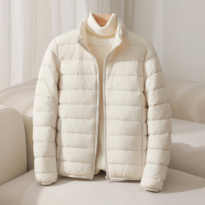 Cozy women's lightweight quilted puffer jacket, perfect for everyday winter casual style.
