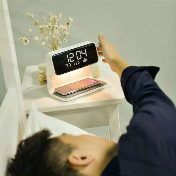 Unisex touch control LED desk lamp with wireless charging base & integrated alarm clock. Modern home decor.