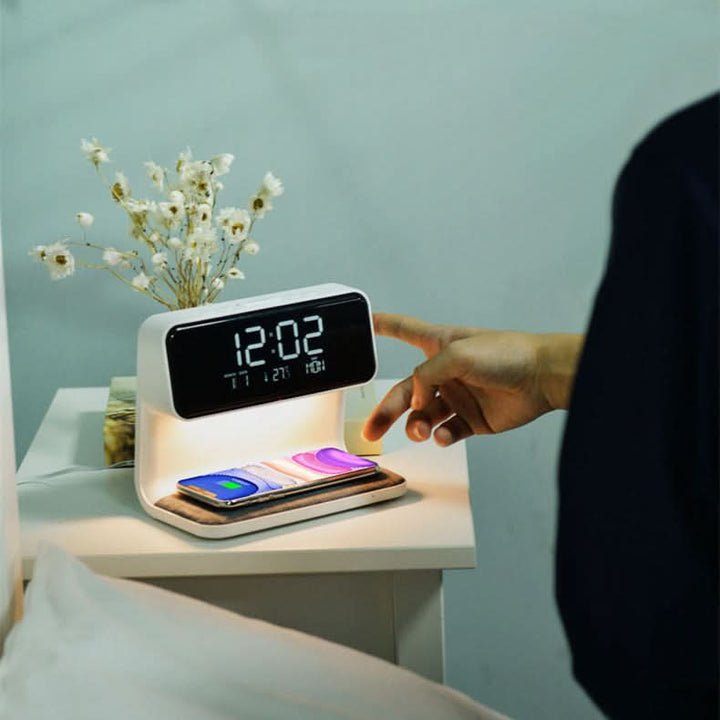 Modern LED table lamp with adjustable brightness, integrated wireless phone charger, and alarm clock display.