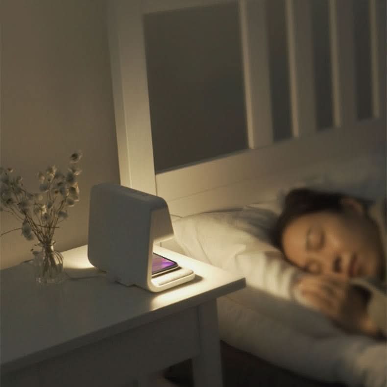 Smart night light lamp with wireless phone charging, easy-to-set alarm clock, and touch dimming control.