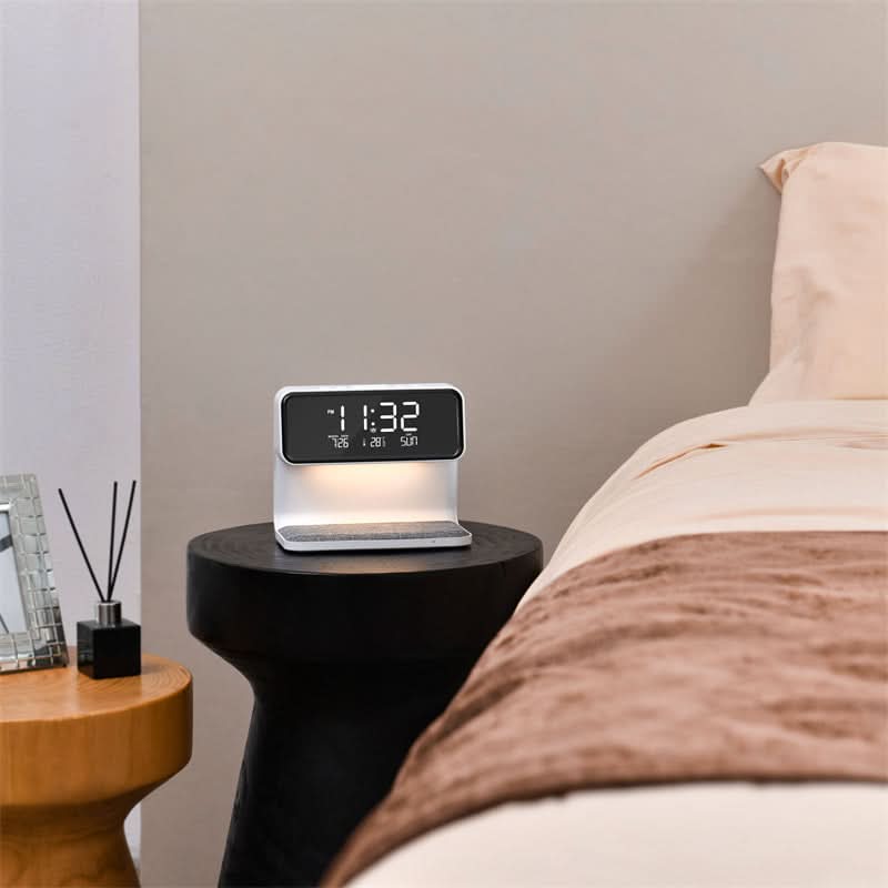Stylish 3-in-1 wireless charging station, LED lamp, and alarm clock, ideal for bedside or office desk.