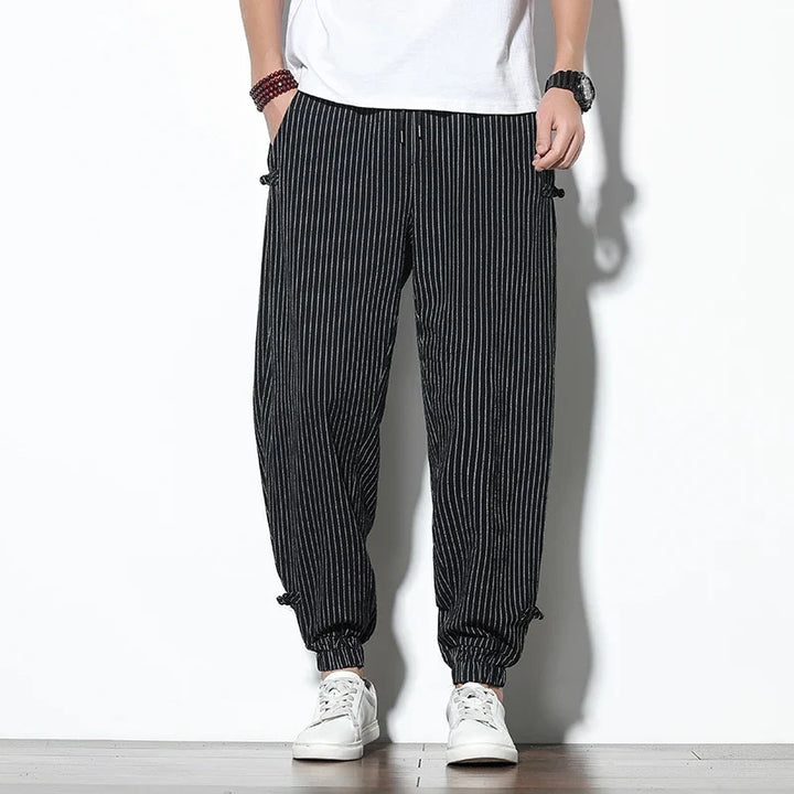 Comfortable men's Kaizen striped joggers, perfect for loungewear, activewear, or everyday casual style.