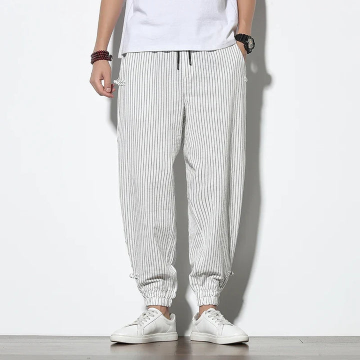 Versatile men's Kaizen striped joggers. Perfect for activewear, loungewear, or stylish casual outings.