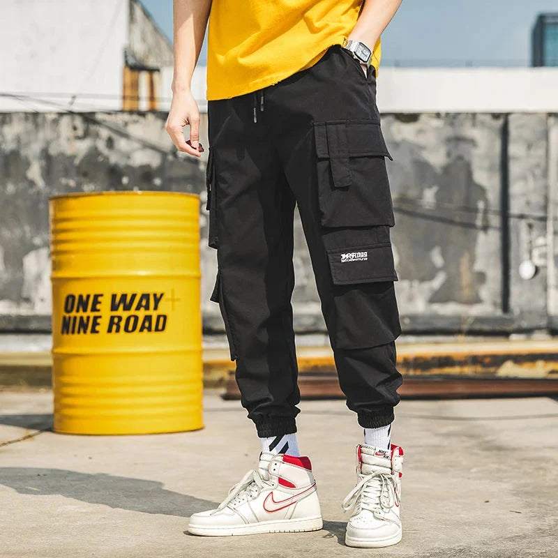 Relaxed fit Men's Cargo Joggers in black, combining comfort with modern urban fashion appeal.