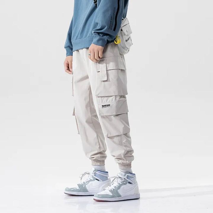 Stylish Men's Black Cargo Joggers with multiple pockets, ideal for modern urban fashion.