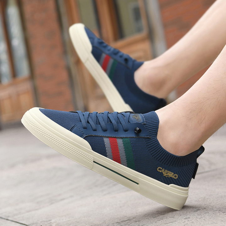 Front view of casual men's walking shoes, designed for everyday comfort and lightweight feel.