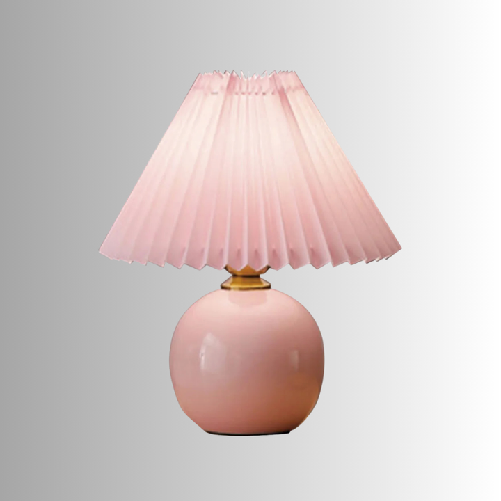 Compact foldable LED pleated lamp, a portable modern lighting solution for any contemporary space.