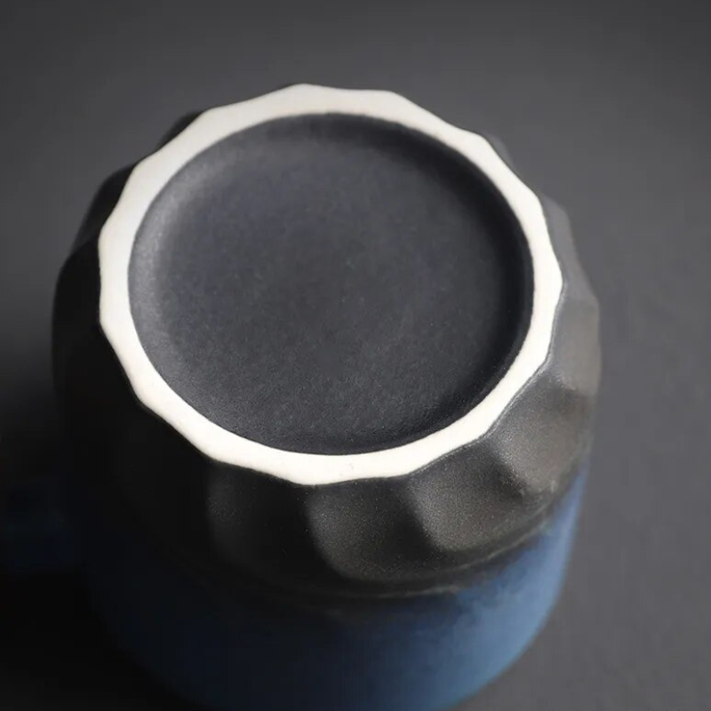 Durable ceramic retro espresso mug with a natural wooden handle, ideal for daily use.