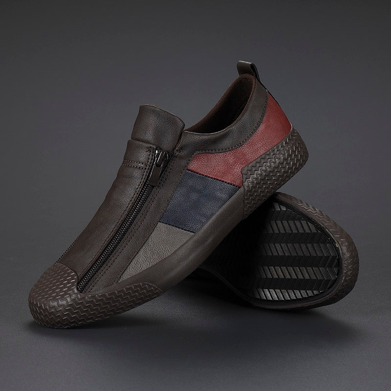 Side view of men's modern color block sneakers, showcasing vibrant design & cushioned comfort.