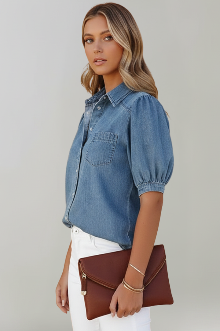 Women's blue button-up shirt featuring stylish puff sleeves and a classic collar for a chic look.