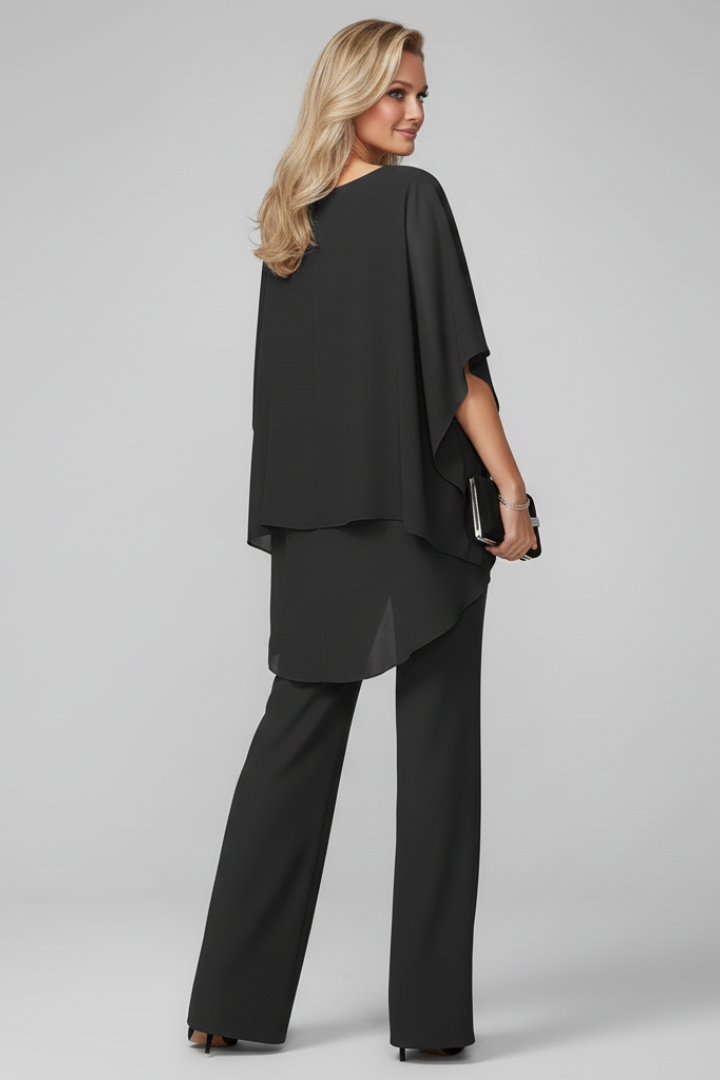 Close-up of a women's coordinated off-shoulder two-piece set, showcasing fabric & chic modern style.