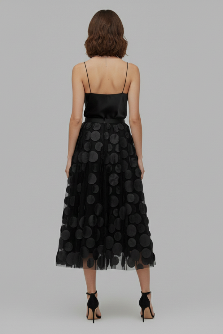 Elegant polka dot full skirt for women, perfect as a party skirt or chic casual wear.