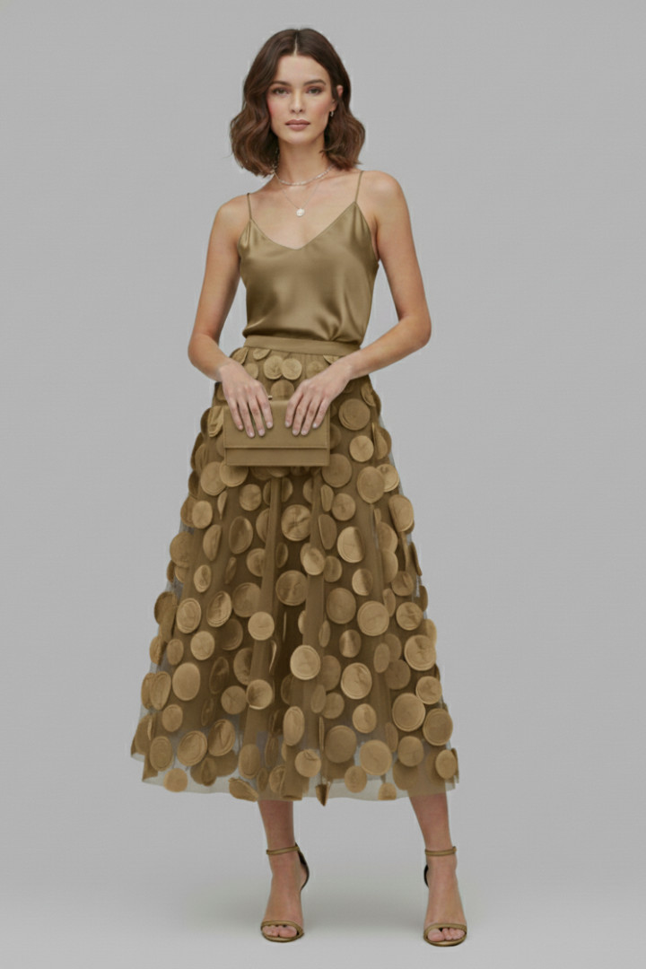 Flattering A-line women's full skirt with polka dots, an elegant midi for versatile fashion looks.