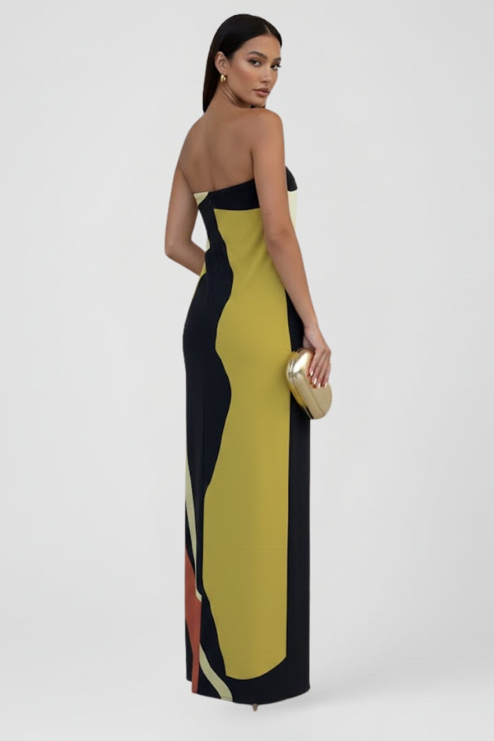 Flowy women's strapless maxi dress with an eye-catching abstract print, perfect casual elegant wear.