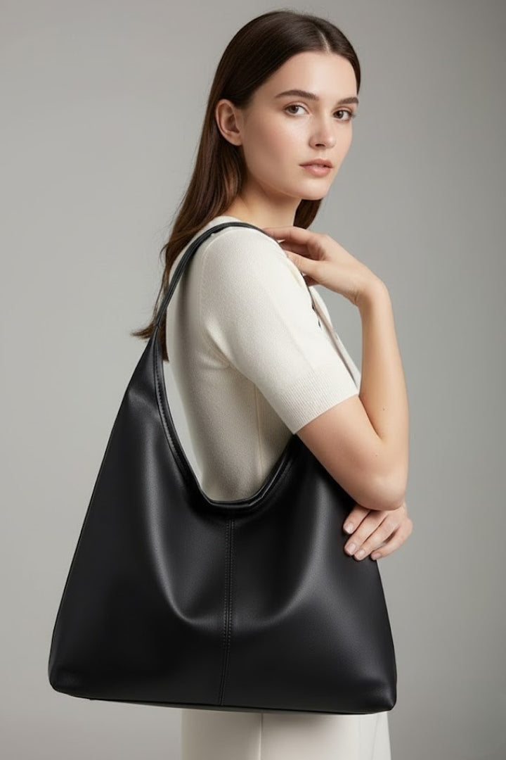 Elegant Black Women's Handbag, a spacious & secure everyday carryall with top zipper for organization.