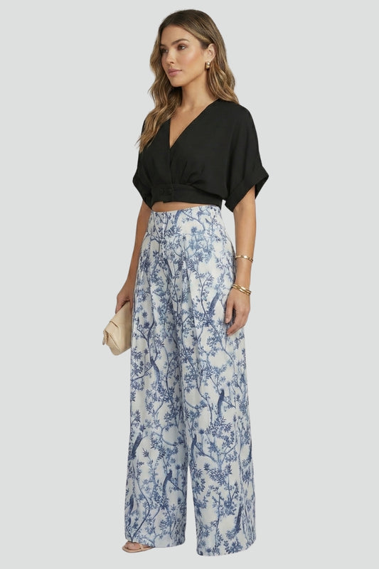 Comfortable women's v-neck co-ord set with flowy wide leg pants, ideal for spring & summer.