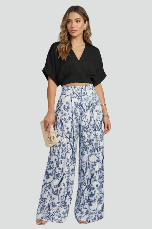 Stylish V-neck top paired with patterned wide leg trousers in a comfortable women's set.