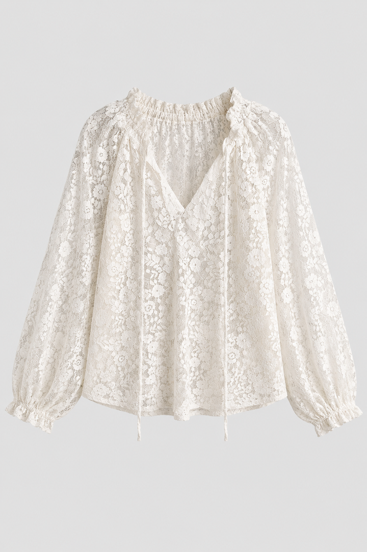 Elegant women's lace top with tied neckline. Versatile long sleeve blouse for chic, feminine fashion.