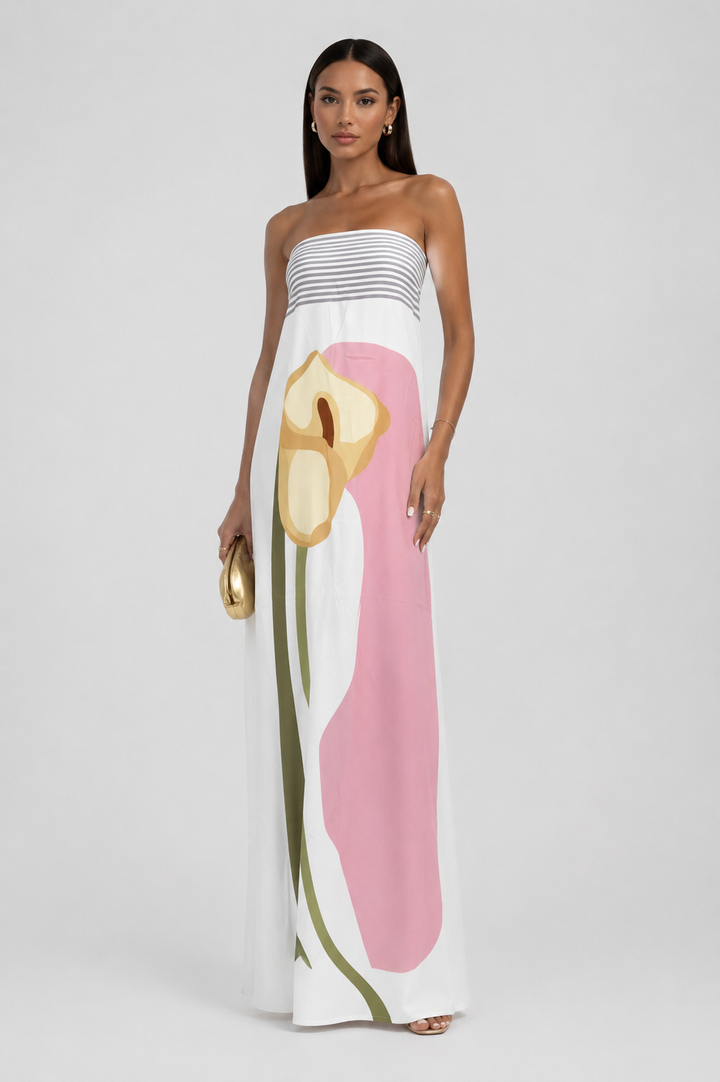 Women's strapless maxi dress with vibrant abstract print, combining casual comfort with elegant style.