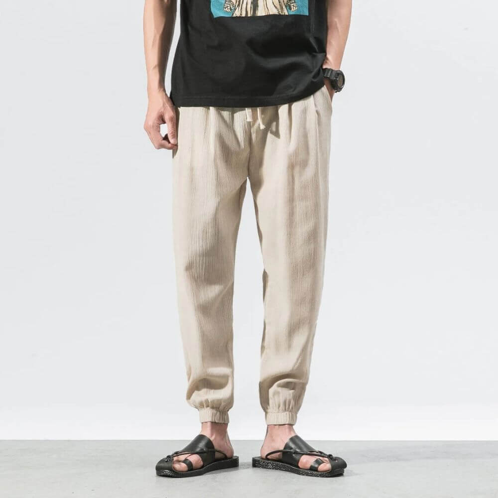 Modern men's joggers, relaxed fit, drawstring for ultimate summer ease.