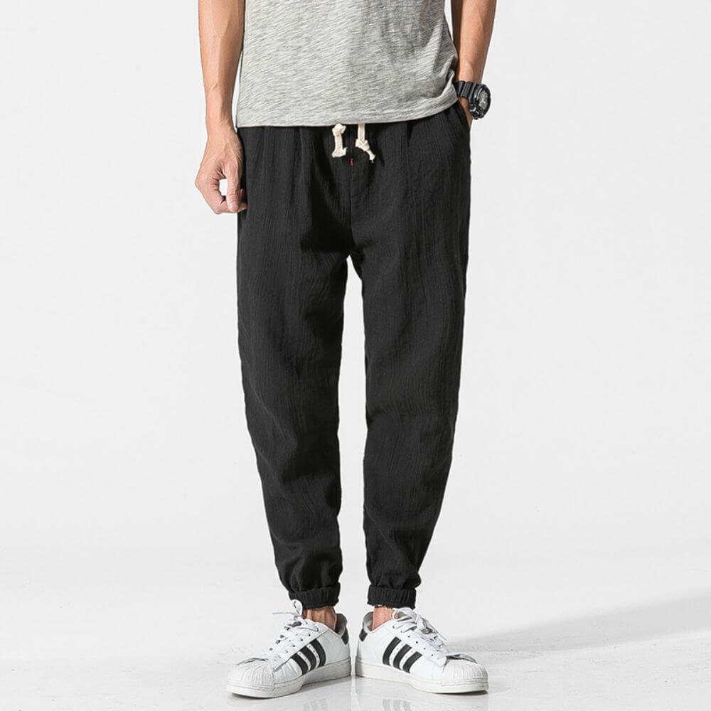 Men's drawstring casual joggers, breathable fabric, great for summer wear.