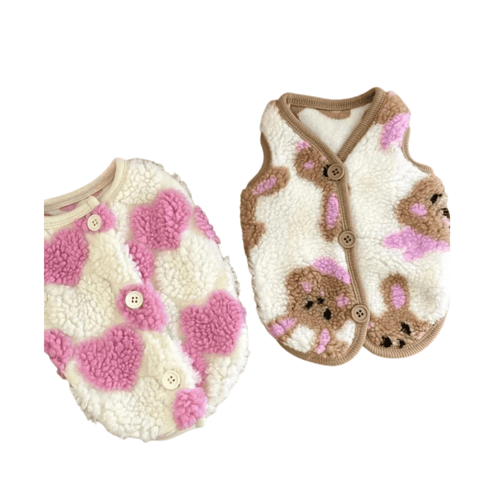 Close-up of rabbit pattern on a soft pink fleece jacket for girls' winter wear