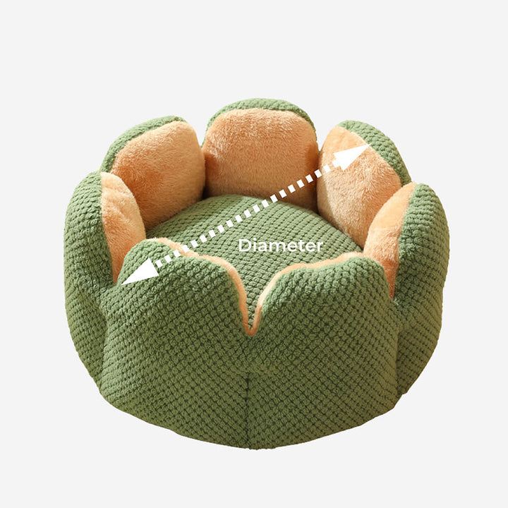 Green cactus pet bed against a neutral background, emphasizing its unique pet supplies design