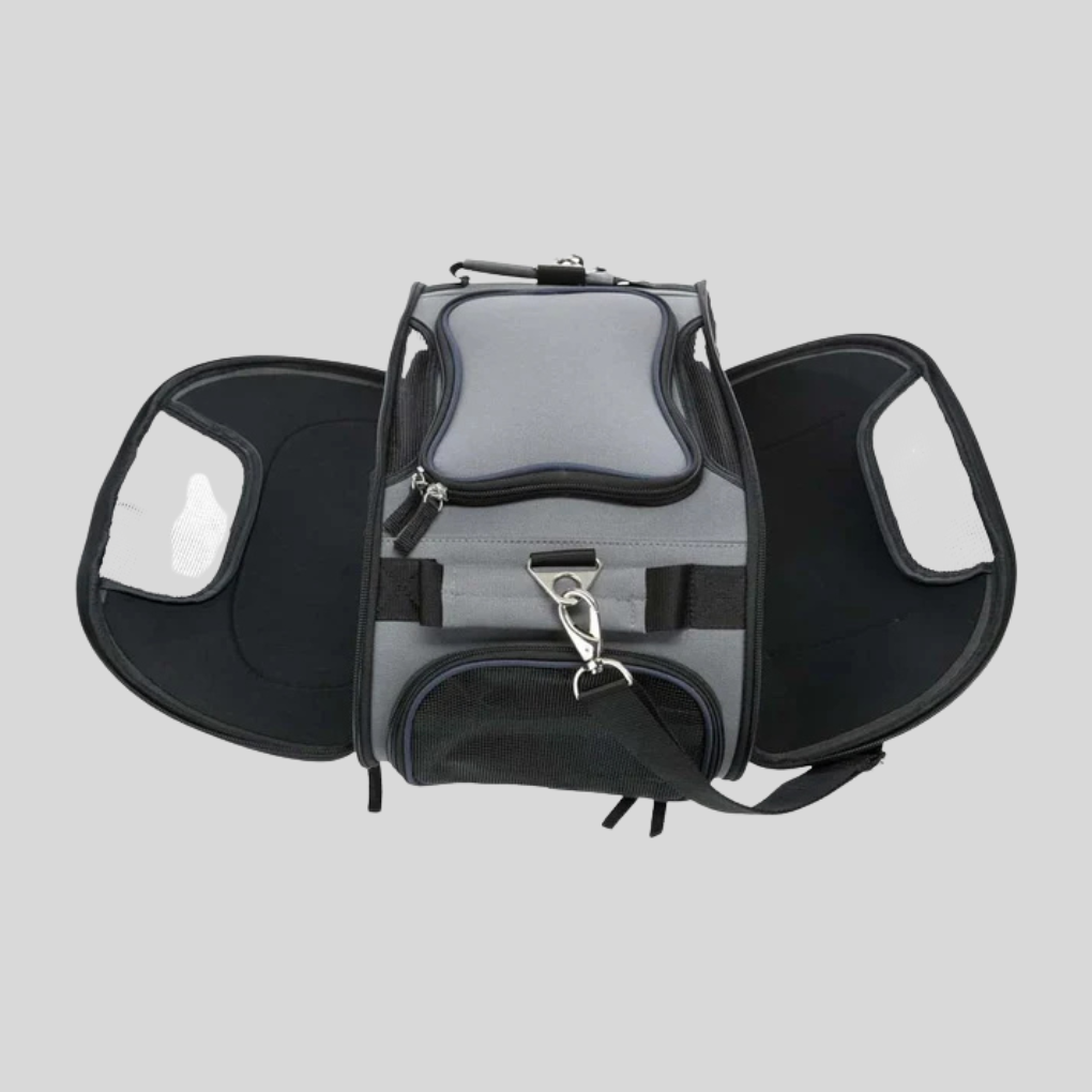 Portable black pet carrier for cats or small dogs, showing top access and shoulder strap.